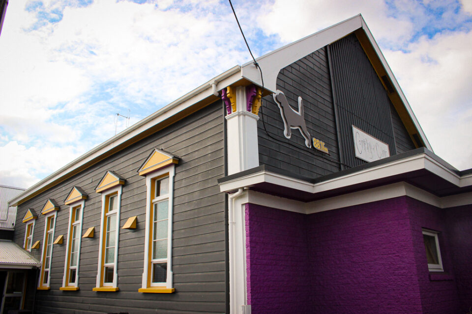 ONEONESIX building from outside with Beagle Radio logo and Company of Giants Logo.