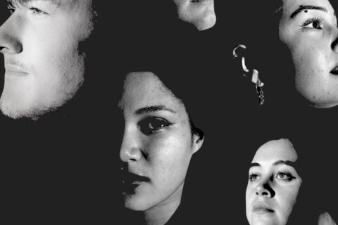 Image of faces in black and white with striking lighting